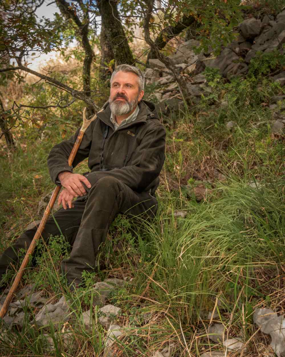 Loden Wood coloured Deerhunter Tatra Trousers on forest background