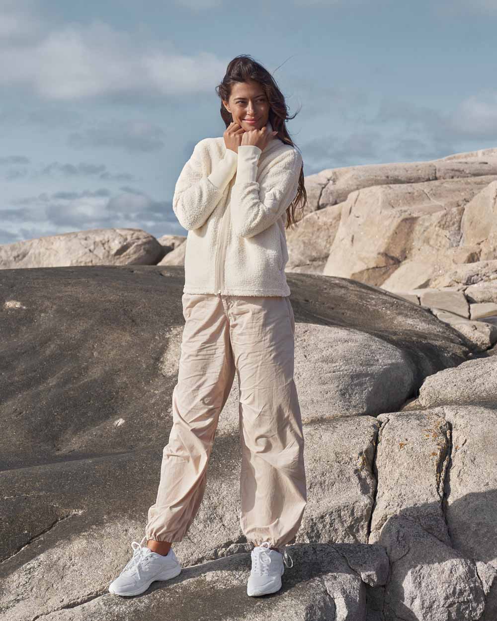 White coloured Didriksons Full-Zip Fleece Jacket on Beach background