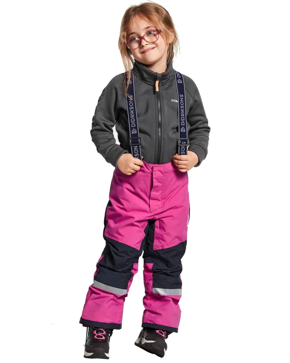 Plastic Pink Coloured Didriksons Bjornen Childrens Pants On A White Background