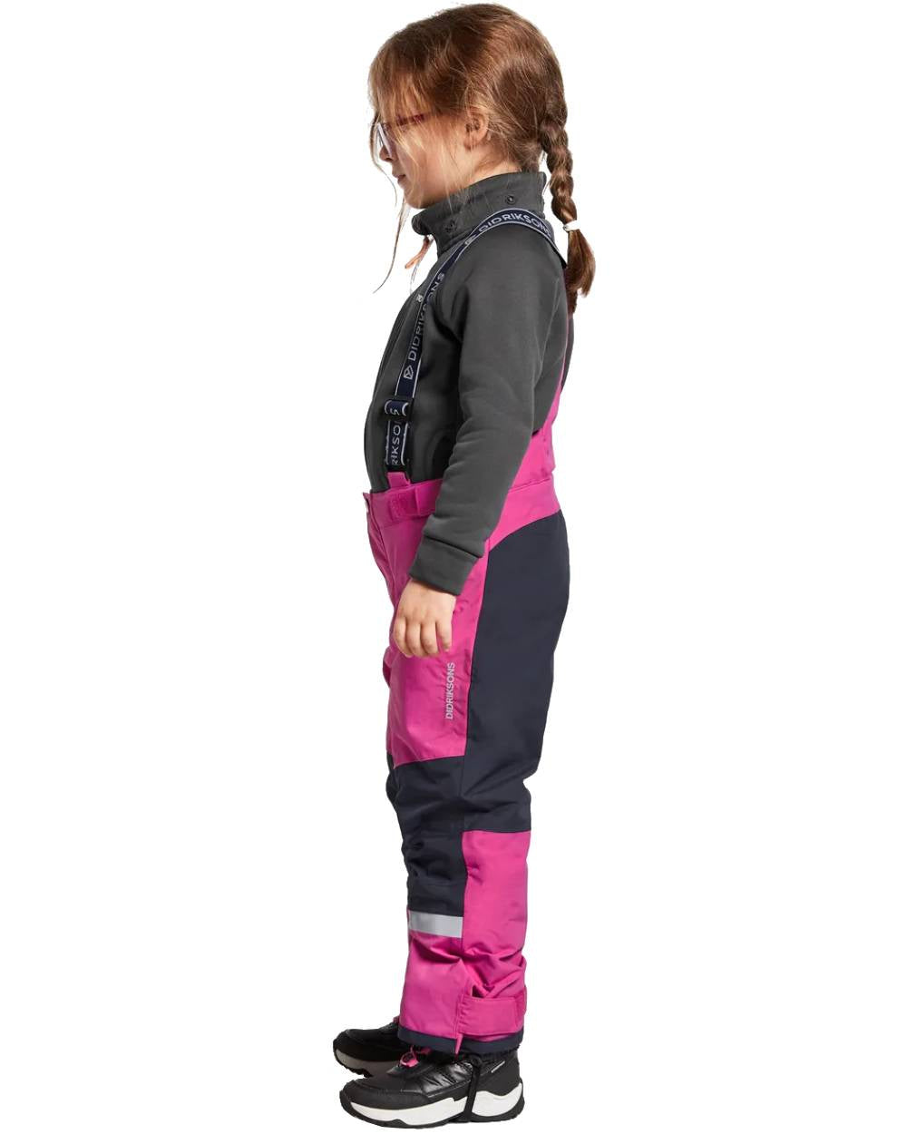 Plastic Pink Coloured Didriksons Bjornen Childrens Pants On A White Background