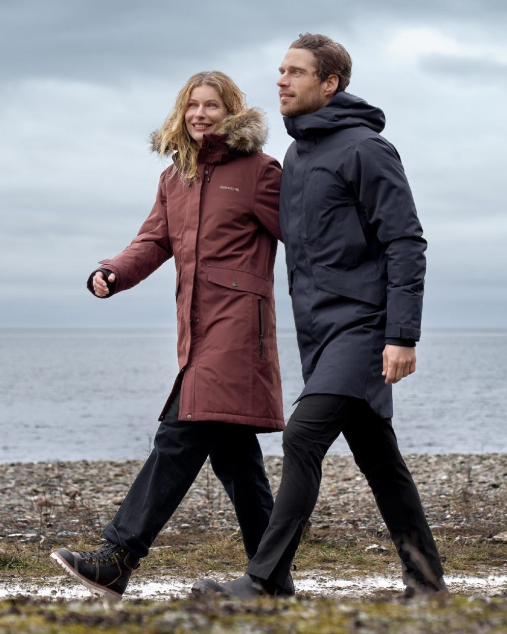 Old Rust Coloured Didriksons Erika Ladies Padded Waterproof Parka 3 On A Coastal Background