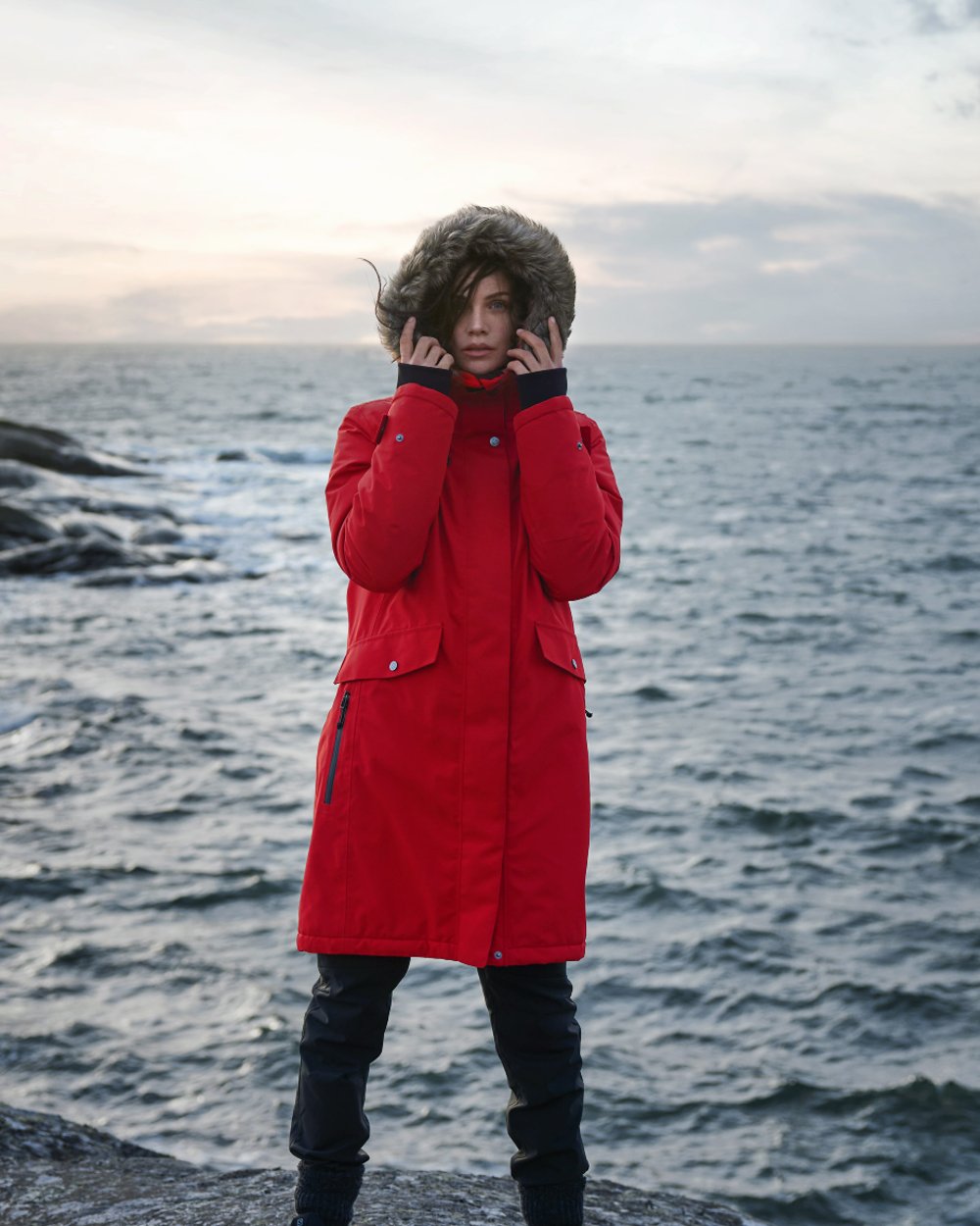 Pomme Red Coloured Didriksons Erika Ladies Padded Waterproof Parka 3 On A Coastal Background