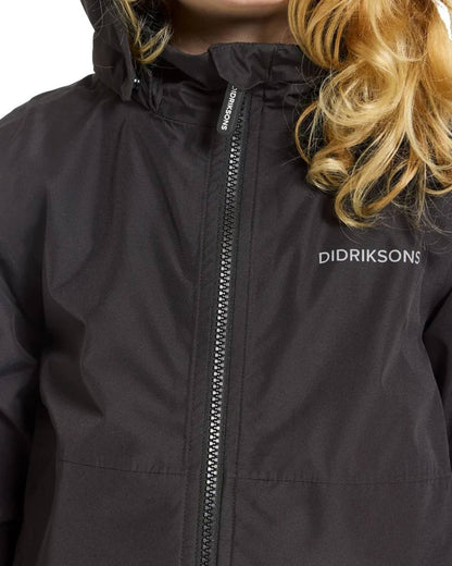 Black Coloured Didriksons Piko Childrens Jacket On A White Background 