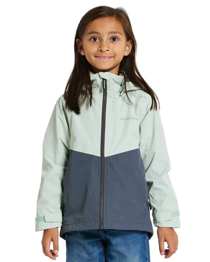 True Blue Coloured Didriksons Tera Childrens Jacket On A White Background 