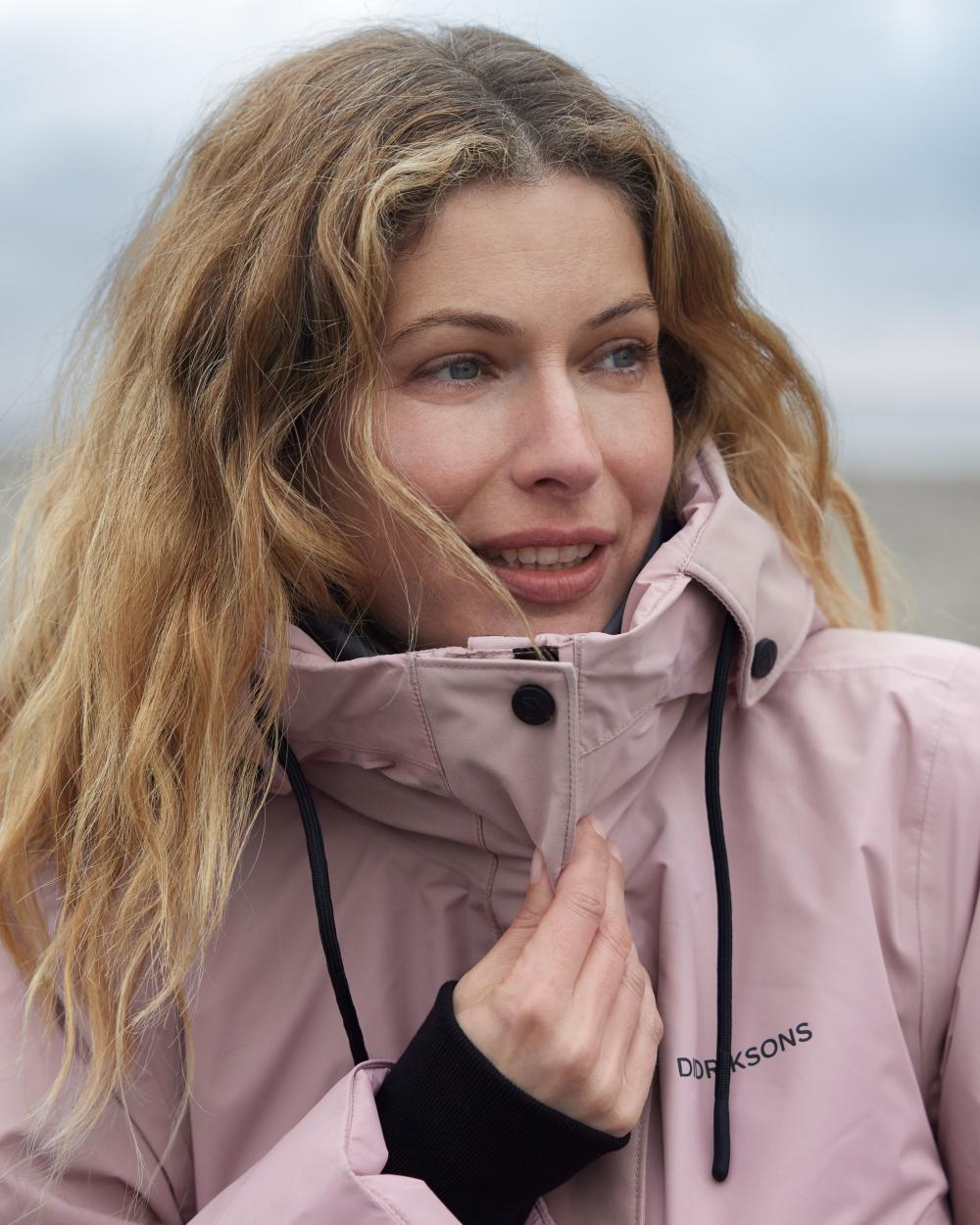 Oyster Lilac Coloured Didriksons Womens Elissa Parka On A Coastal Background