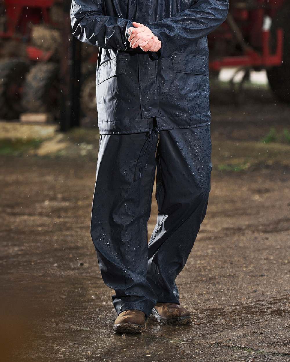 Navy Coloured Fort Airflex Waterproof Breathable Trousers On A Street Background