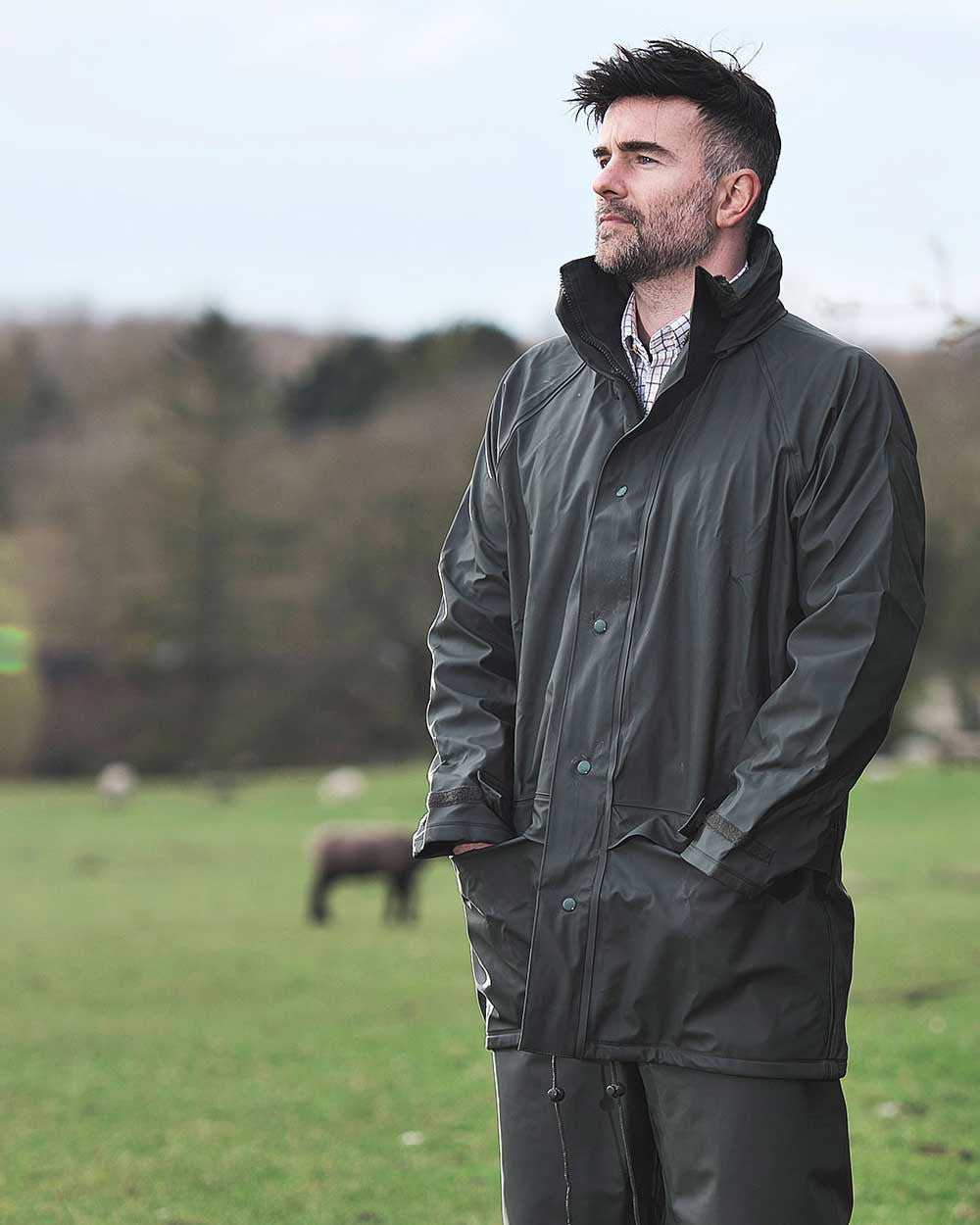 Green Coloured Fort Flex Jacket On A Field Background