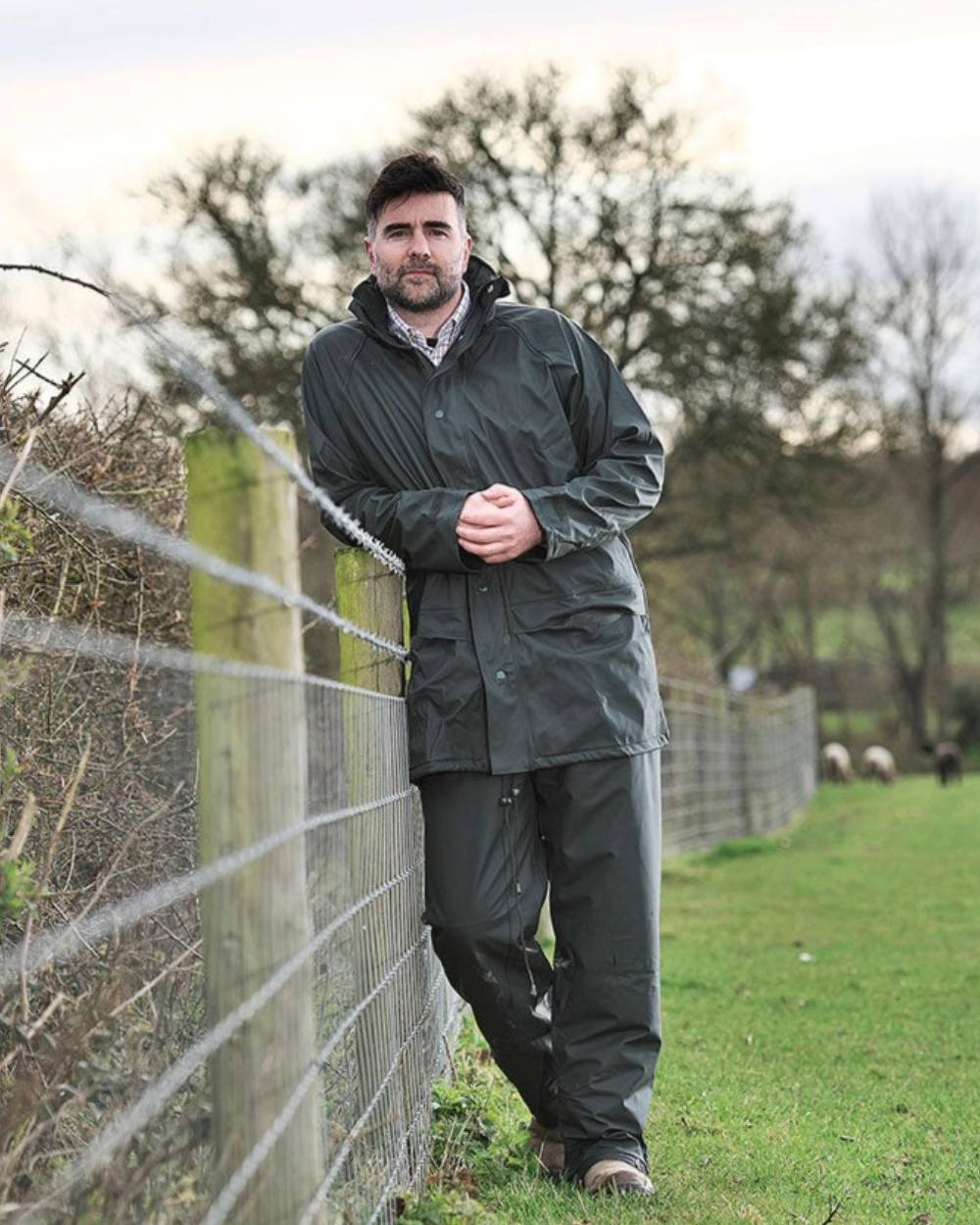 Green Coloured Fort Flex Jacket On A Field Background