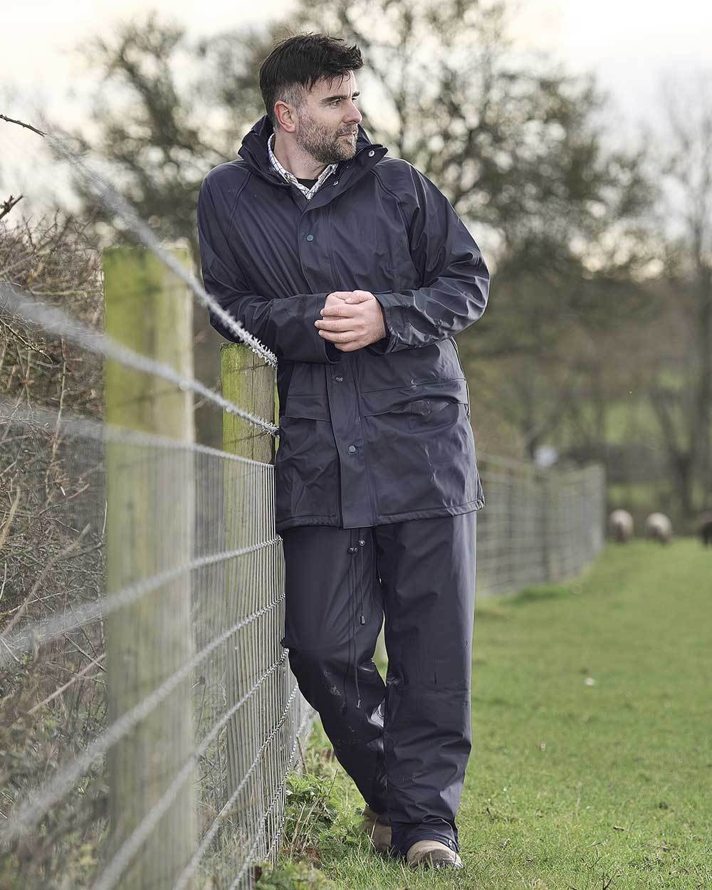 Navy Blue Coloured Fort Flex Jacket On A Field Background