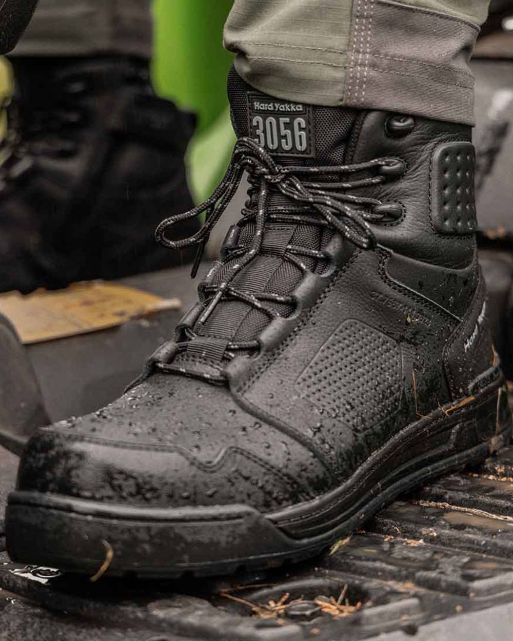 Black Coloured Hard Yakka Mens 3056 Lace Zip Safety Boots on Outdoor Background