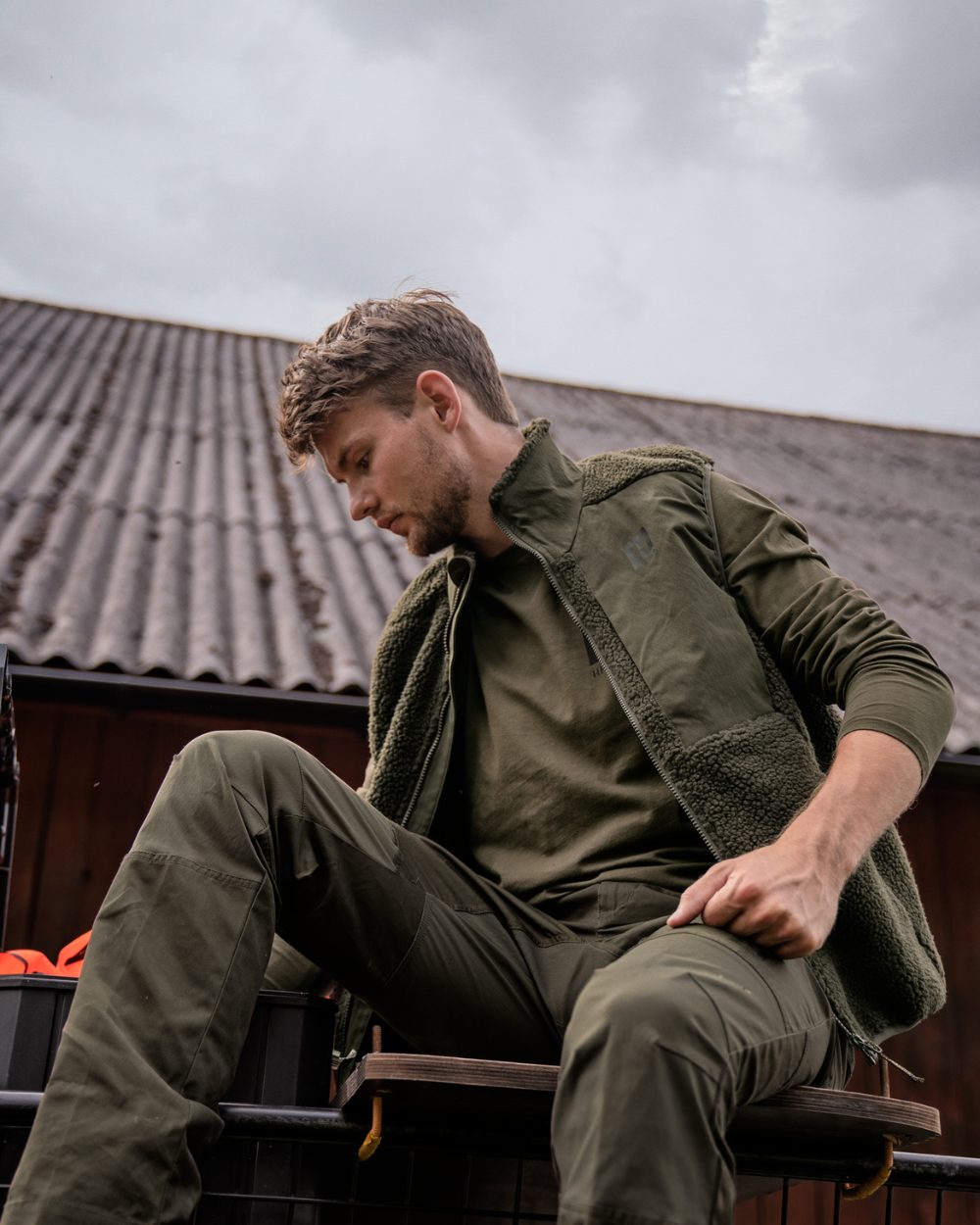 Rosin Coloured Harkila Fjell Polar Waistcoat on outdoor background