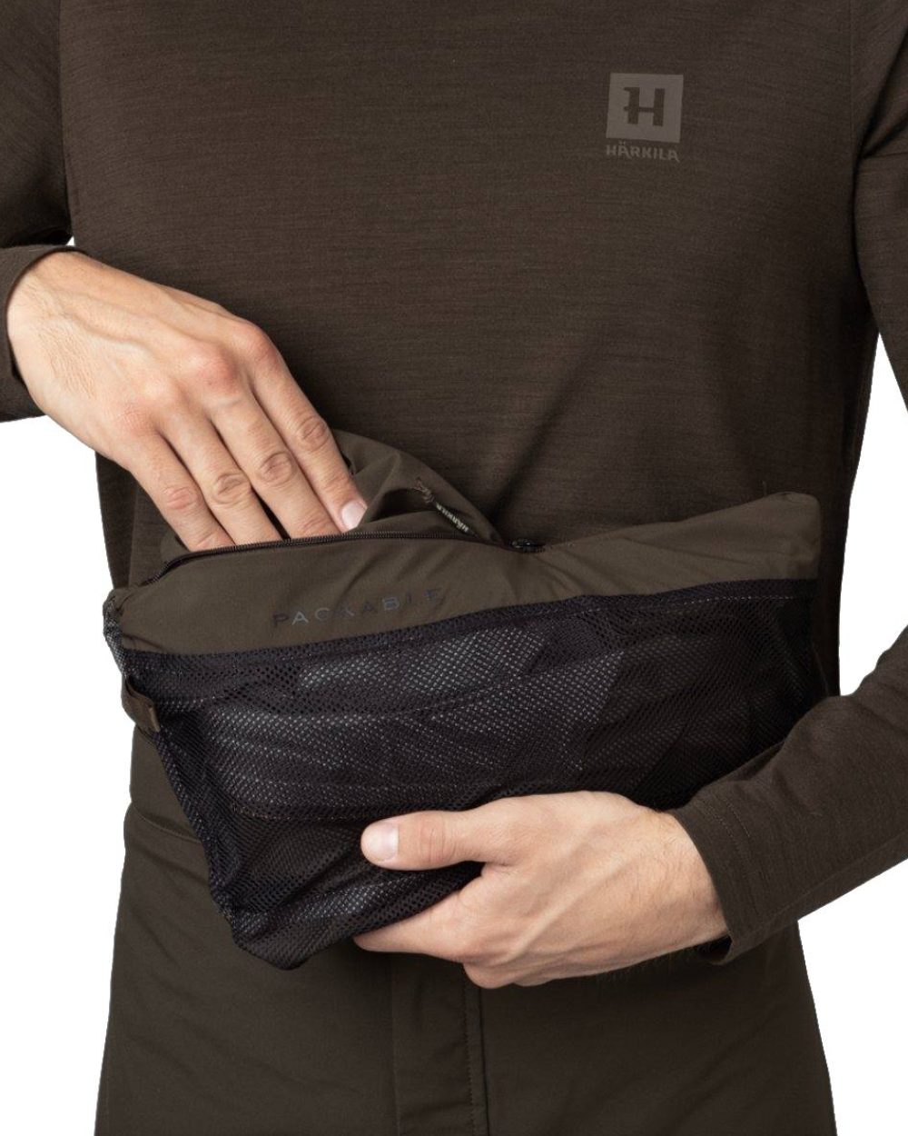 Willow Green Coloured Harkila Logmar HWS Packable Jacket on white background