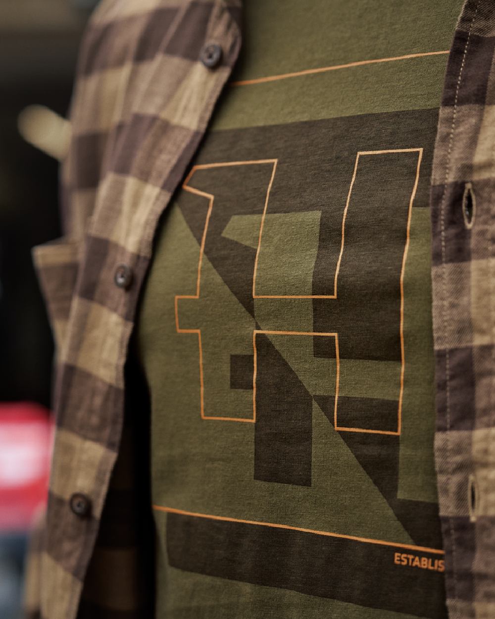 Dark Olive Coloured Harkila Mens H-Logo Short Sleeve T-Shirt on Outdoor Background