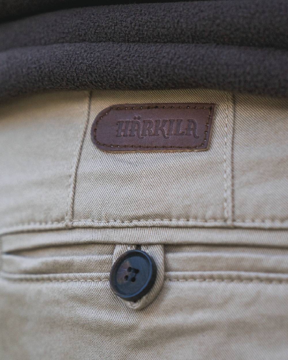 Sand Coloured Harkila Norberg Chinos on white background