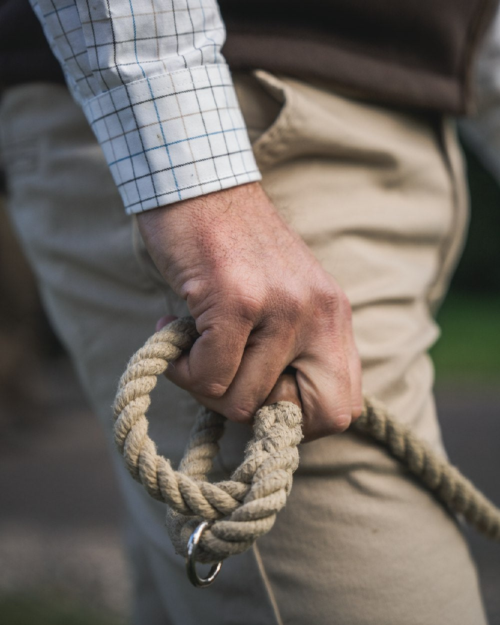 Sand Coloured Harkila Norberg Chinos on blurry background