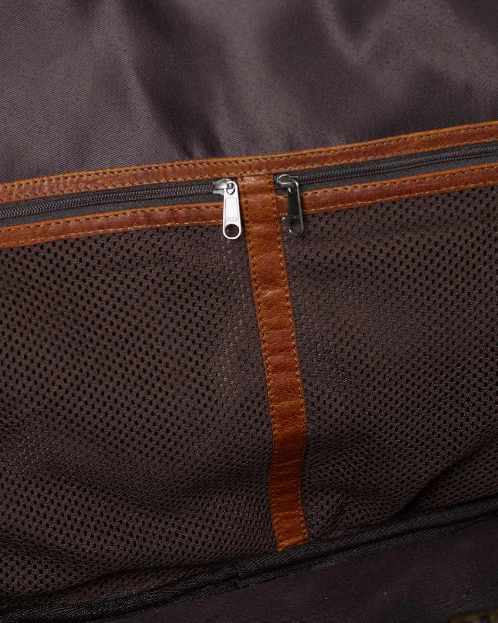 Warm Olive Coloured Harkila Weekend Bag 30L on blurry background