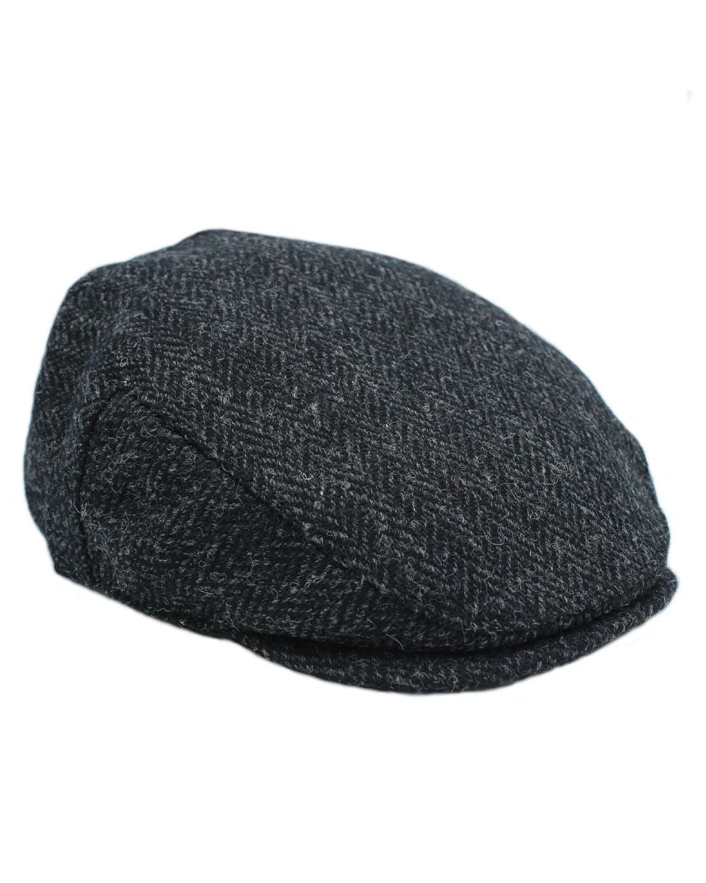 Black Herringbone Coloured Heather Highland Harris Tweed Flat Cap On A White Background