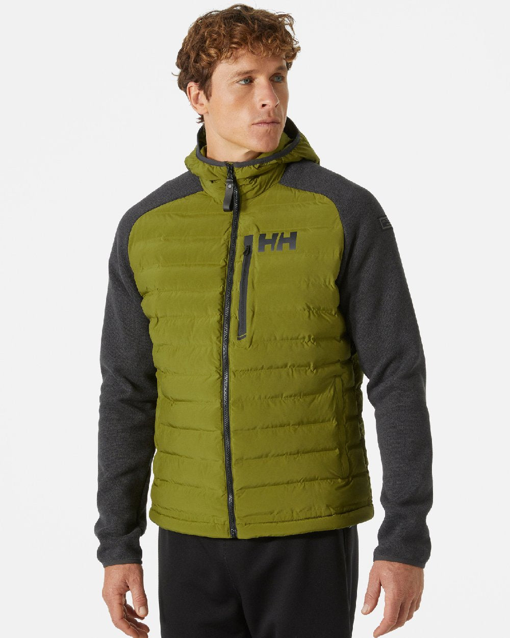 Olive Green coloured Helly Hansen Mens Arctic Ocean Hybrid Insulator Jacket on grey background