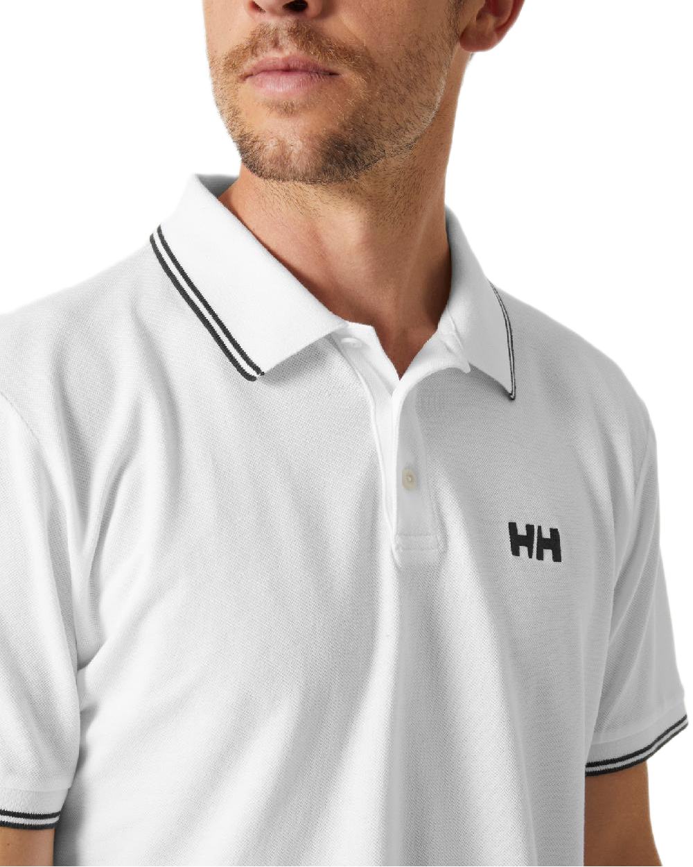 White coloured Helly Hansen Mens Genova Polo T-Shirt on white background
