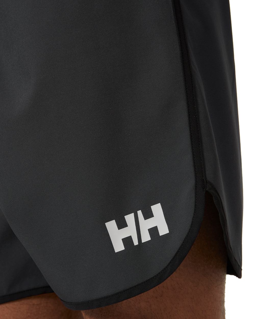Ebony coloured Helly Hansen Mens HP 7 inch Curve Board Shorts on white background