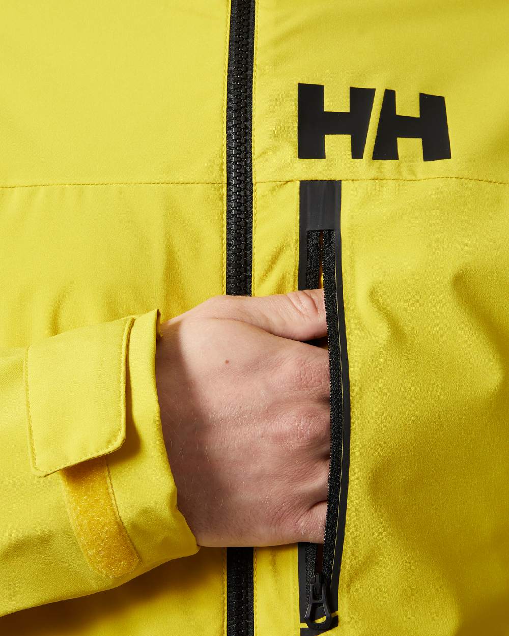 Gold Rush coloured Helly Hansen Mens HP Racing Sailing Jacket on white background