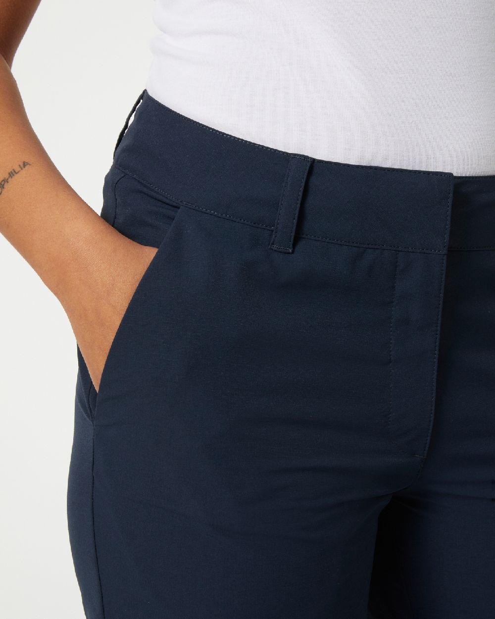 Navy coloured Helly Hansen Womens Quick Dry Pants on grey background