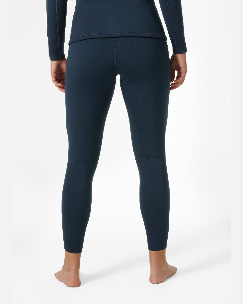 Navy coloured Helly Hansen Womens Waterwear Tights 2.0 on grey background 