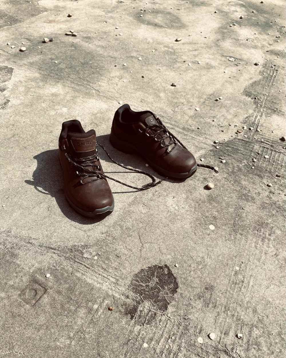 Brown Coloured Hi-Tec Mens Walk Lite Camino Ultra Shoes On A Street Background