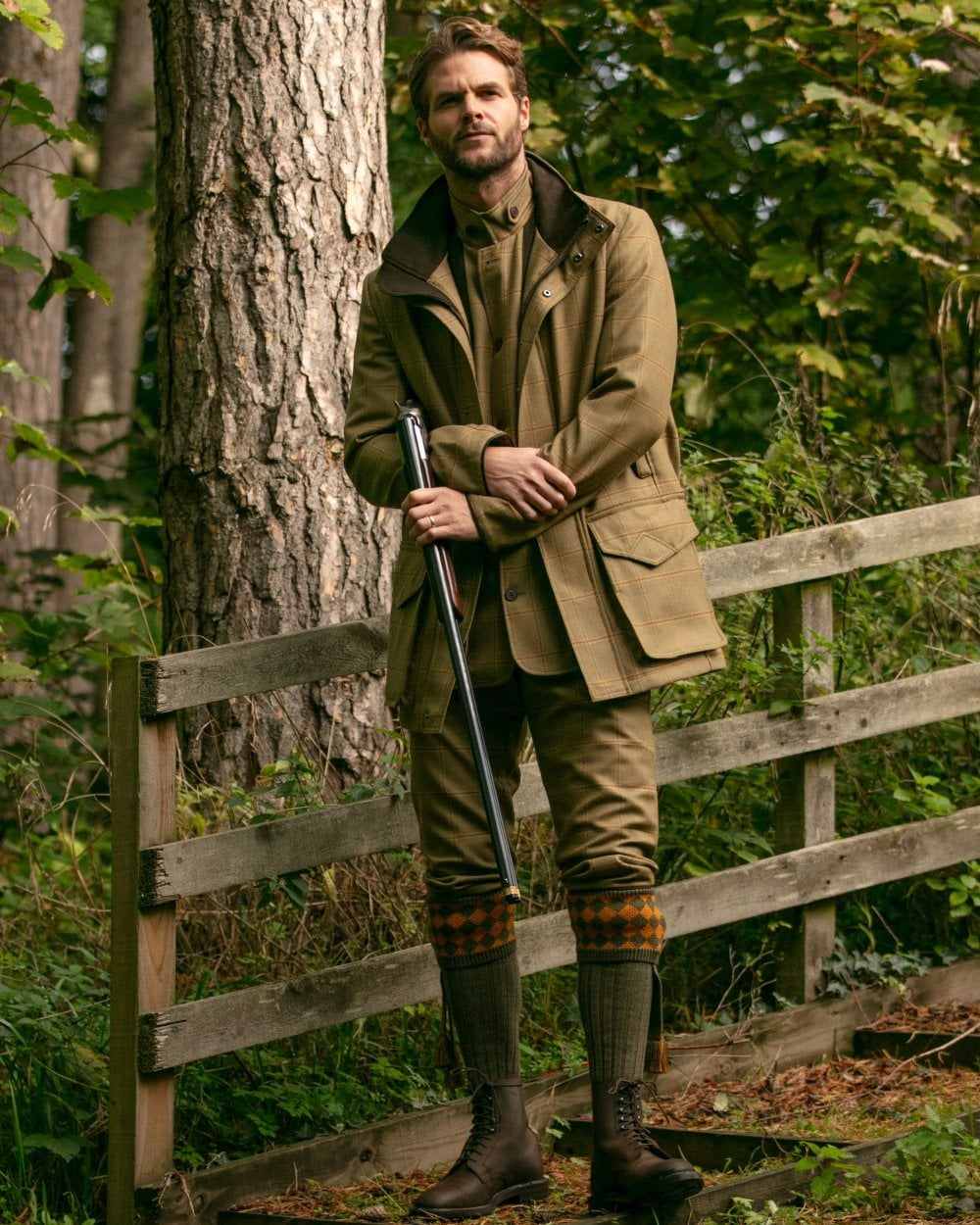 Bracken Coloured House of Cheviot Chessboard Socks On A Forest Background