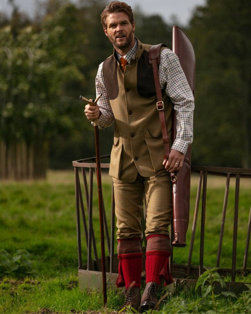 Brick Red coloured House of Cheviot Tayside Socks on outdoor background