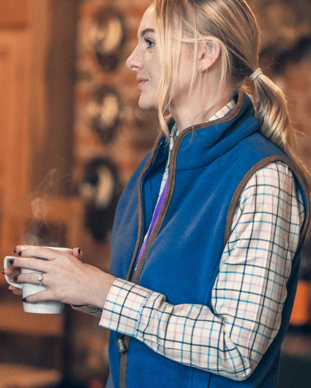 Denim coloured Jack Pyke Ladies Countryman Fleece Gilet on wooden wall background