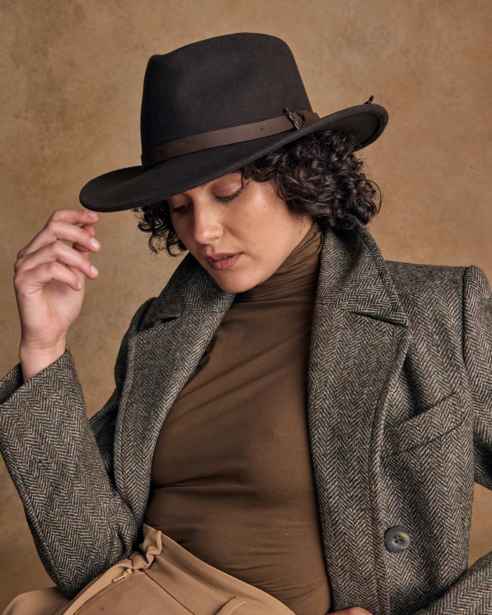 Brown coloured Jack Murphy Boston Crushable Felt Hat on wall background