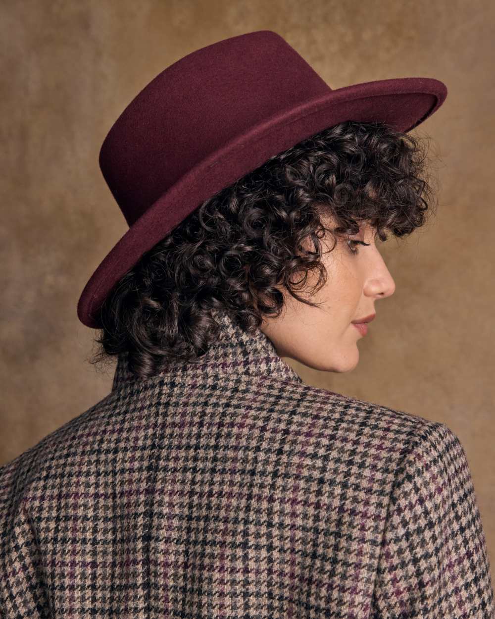 Burgundy coloured Jack Murphy Boston Crushable Felt Hat on Cream background