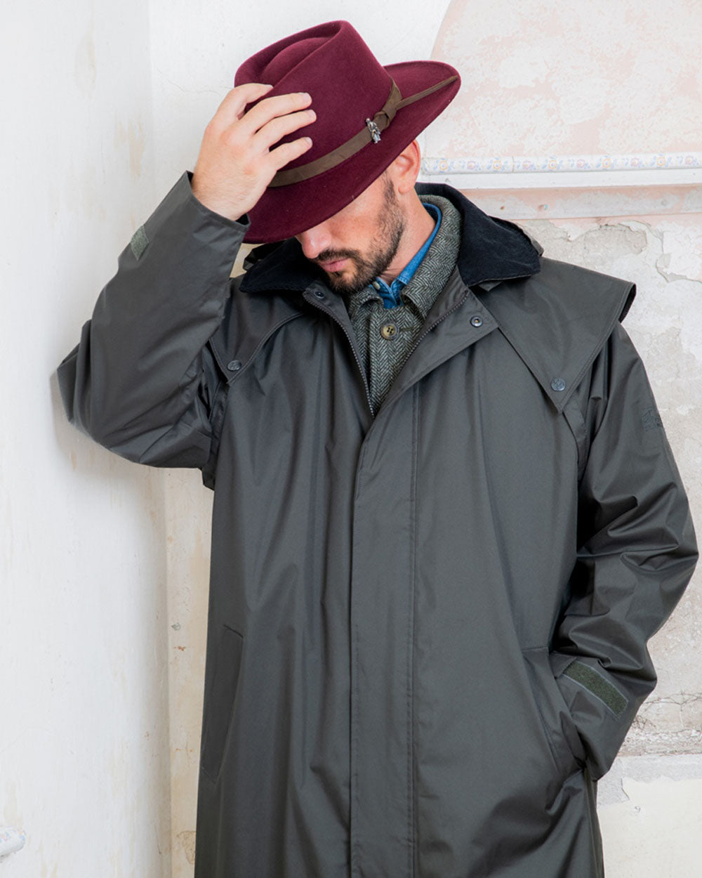 Burgundy coloured Jack Murphy Boston Crushable Felt Hat on wall background
