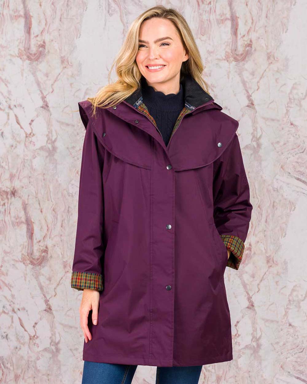 Blackberry coloured Jack Murphy Cotswold Ladies Waterproof 3/4 Coat on Pink background