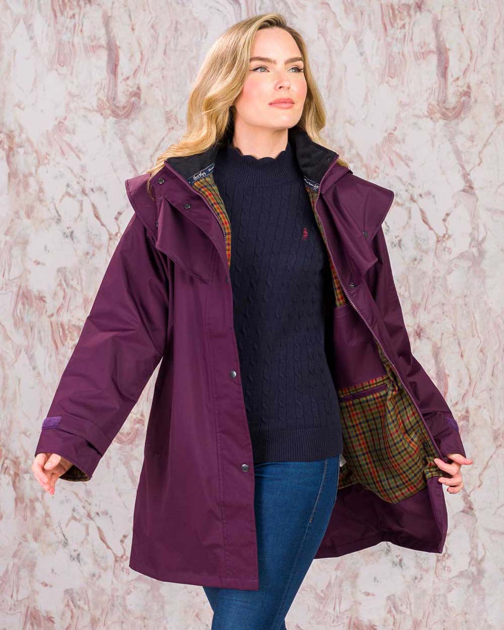 Blackberry coloured Jack Murphy Cotswold Ladies Waterproof 3/4 Coat on Pink background