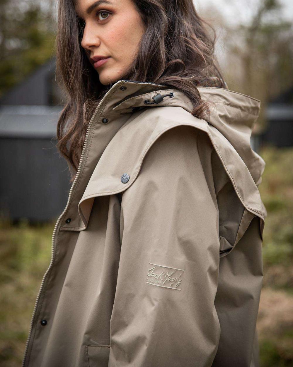 Chincilla coloured Jack Murphy Cotswold Ladies Waterproof 3/4 Coat on forest background