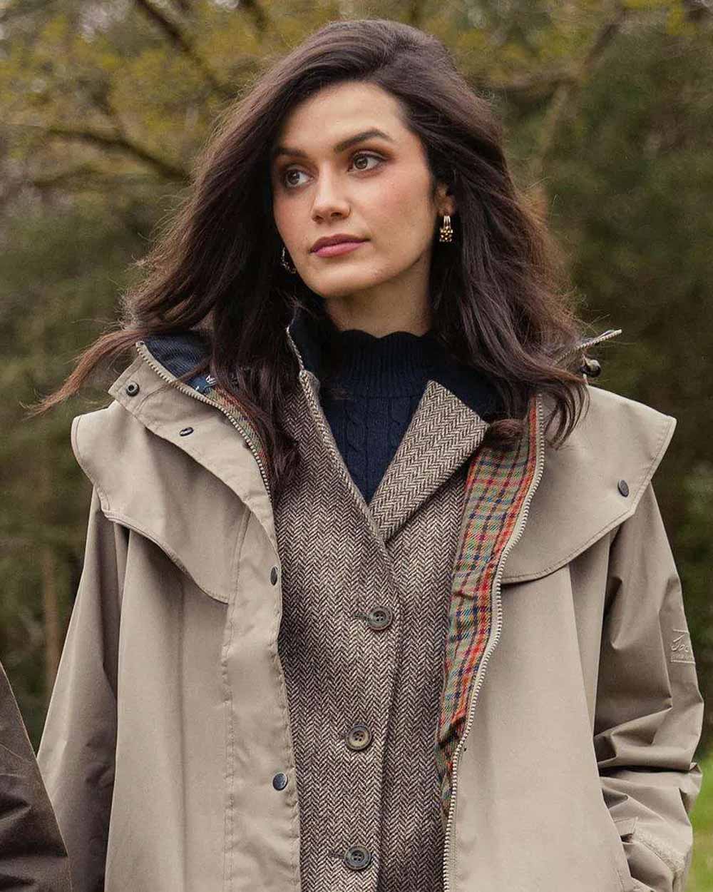 Chincilla coloured Jack Murphy Cotswold Ladies Waterproof 3/4 Coat on Forest background