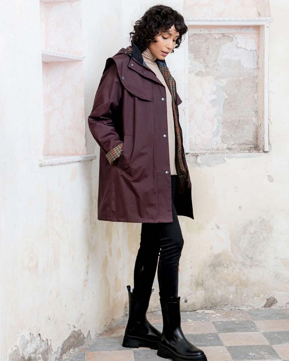 Deep Claret coloured Jack Murphy Cotswold Ladies Waterproof 3/4 Coat on wall background