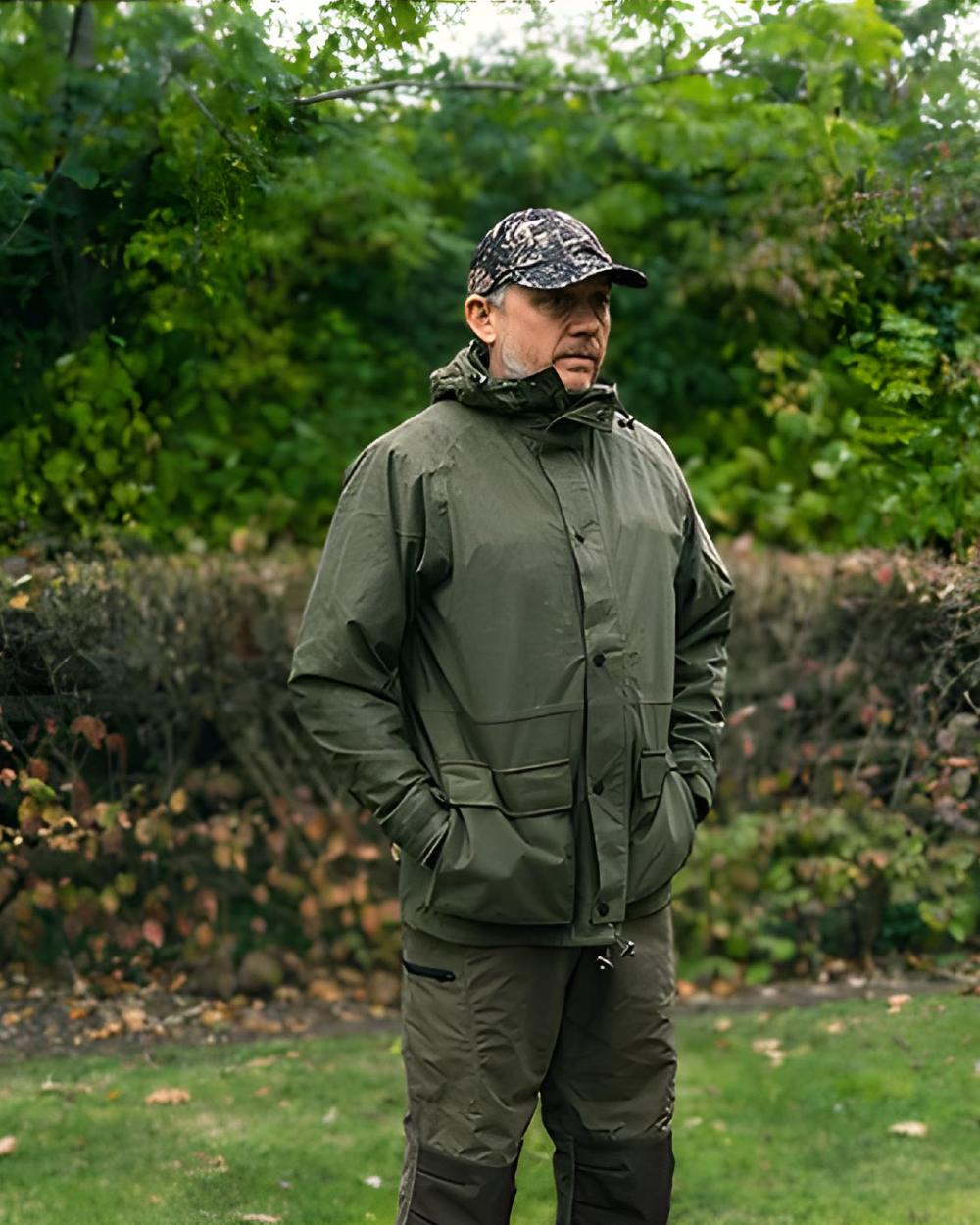 Green coloured Jack Pyke Rannock Jacket on tree background