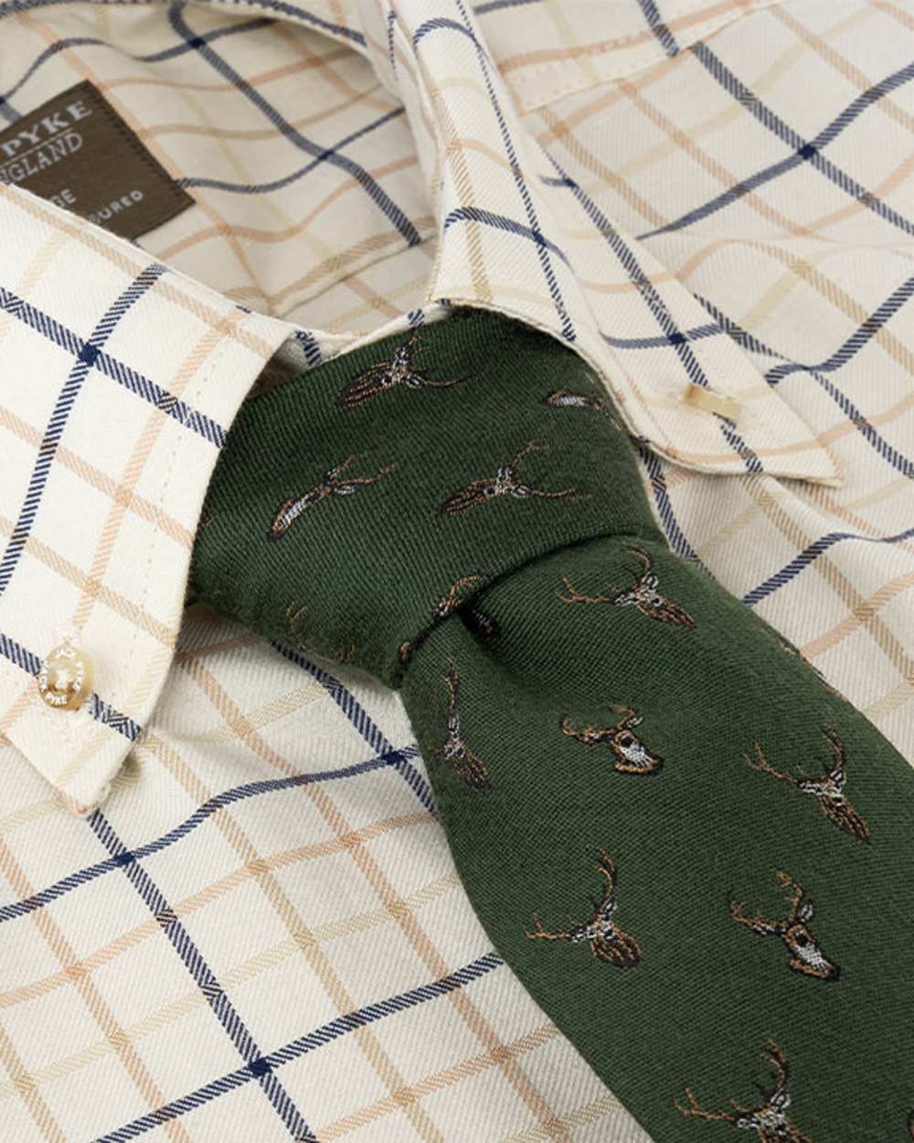 Green coloured Jack Pyke Silk Tie Stag on shirt background