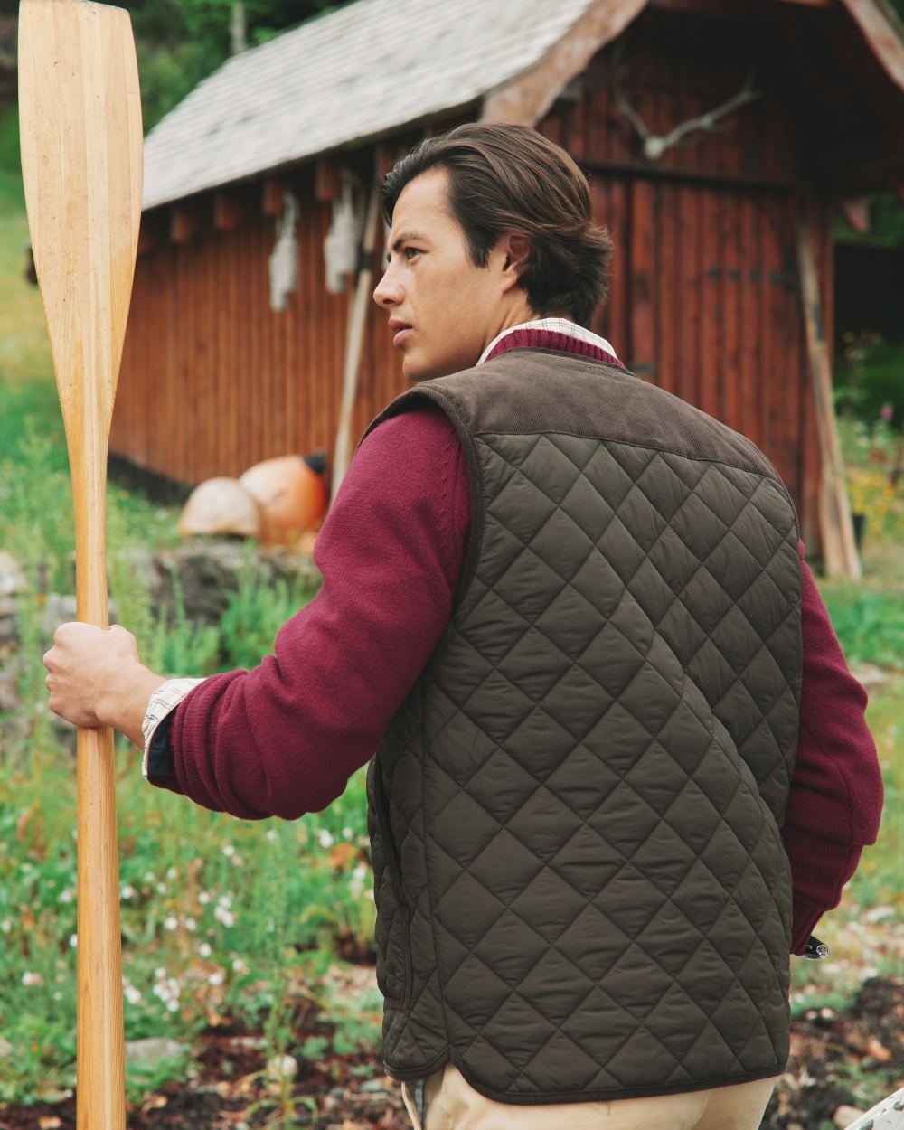 Brown Coloured Joules Gibson Quilted Lightweight Gilet On A Forest Background