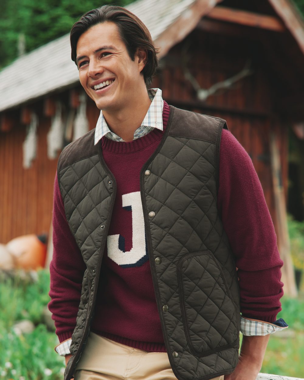 Brown Coloured Joules Gibson Quilted Lightweight Gilet On A Forest Background