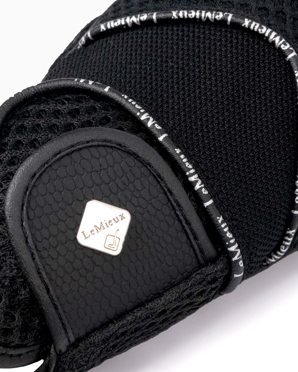 Black coloured LeMieux 3D Mesh Riding Gloves on white background