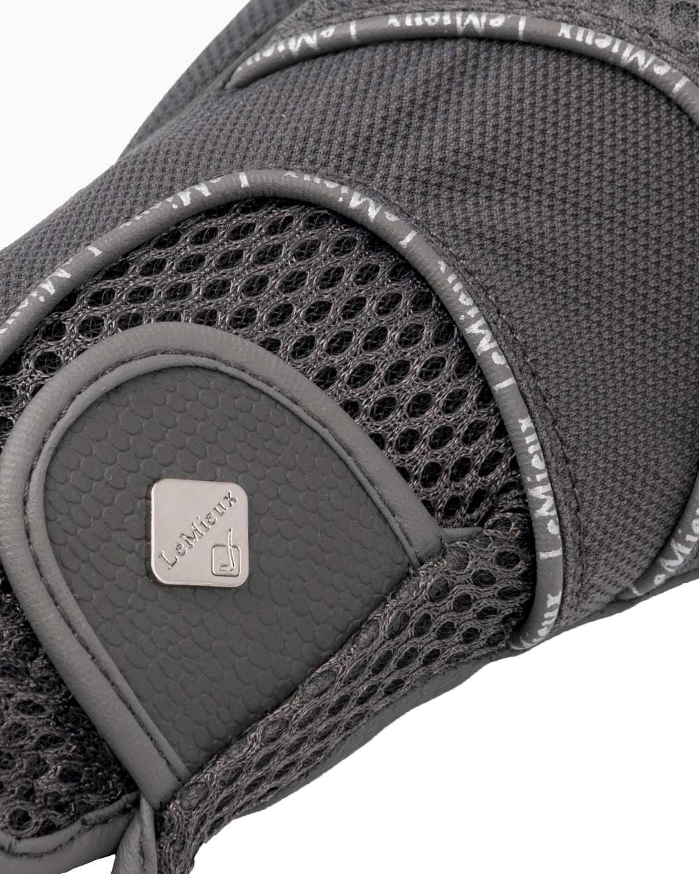 Grey coloured LeMieux 3D Mesh Riding Gloves on white background