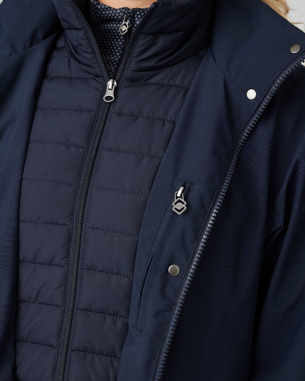 Navy coloured LeMieux Amelie Waterproof Lightweight Riding Coat on white background