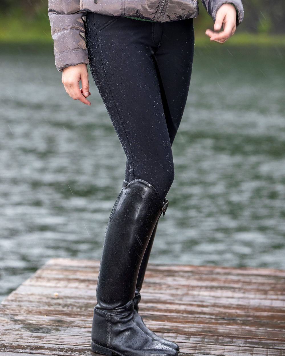 Black coloured LeMieux Drytex Waterproof Breeches with sea in background 