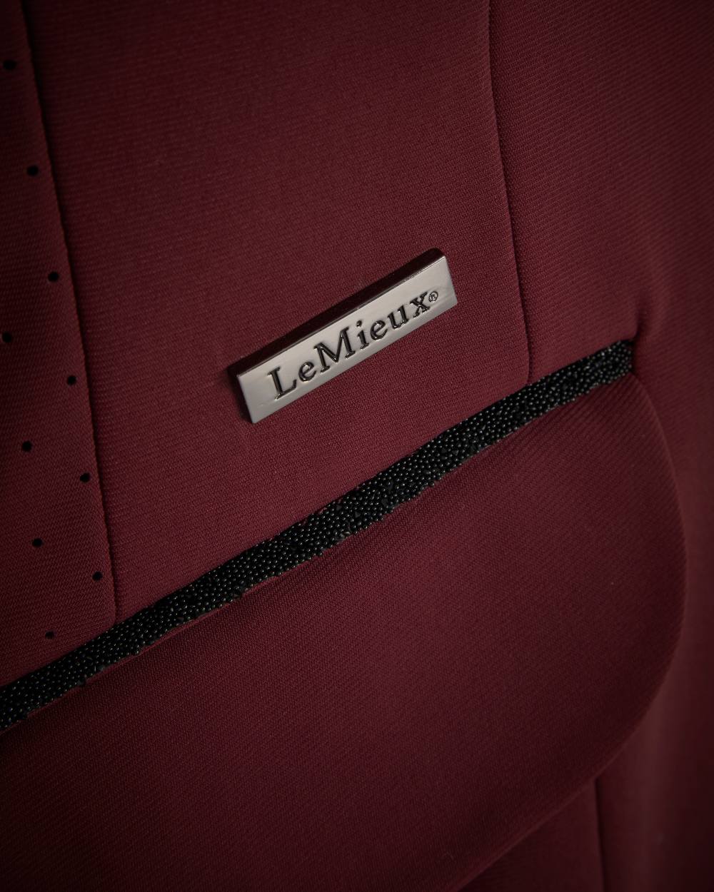 Burgundy coloured LeMieux Dynamique Show Jacket on white background