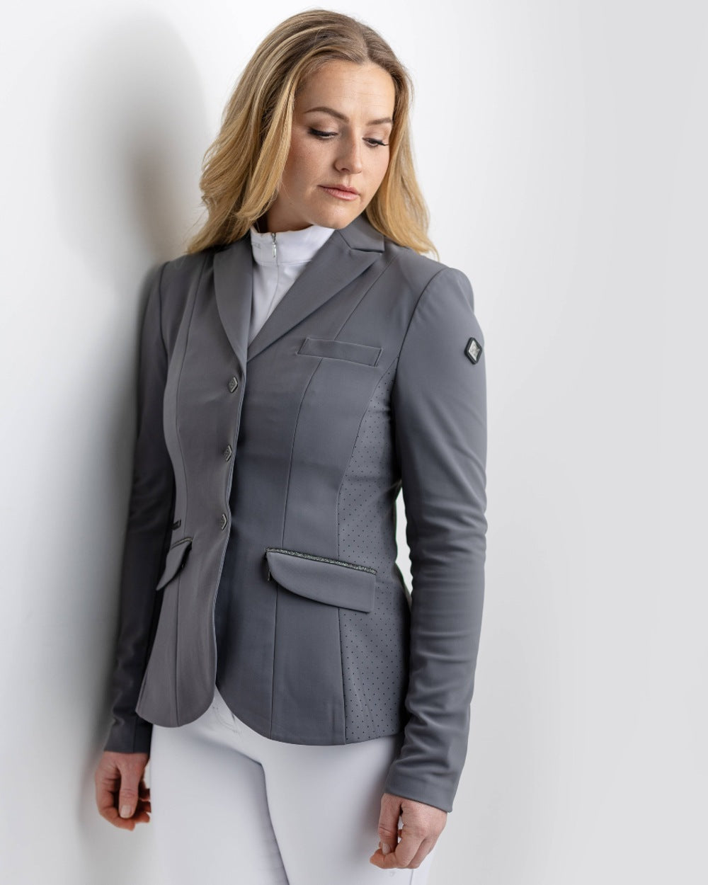 Graphite coloured LeMieux Dynamique Show Jacket on grey background