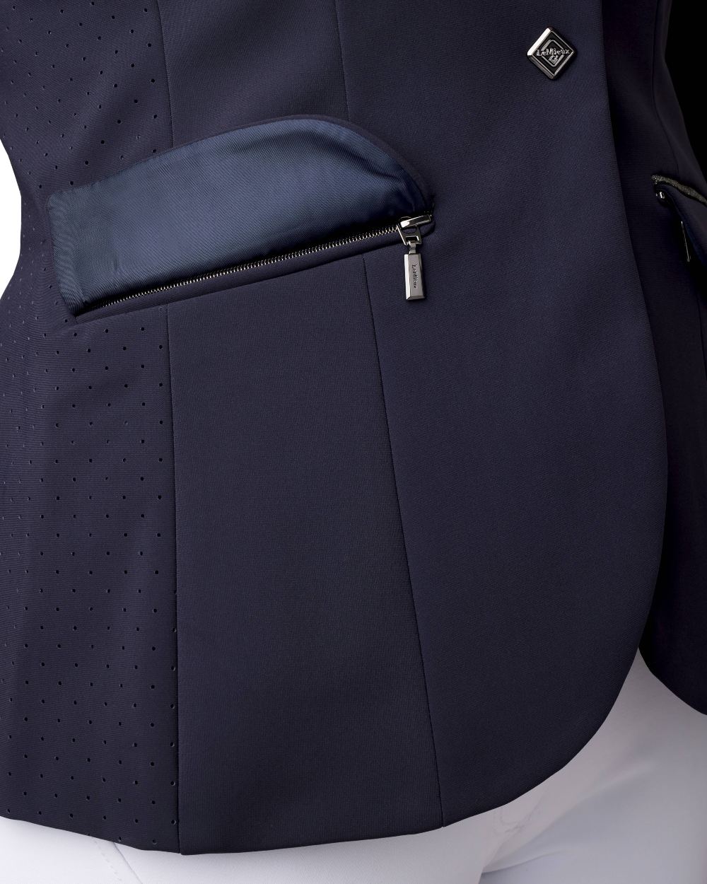 Navy coloured LeMieux Dynamique Show Jacket on white background